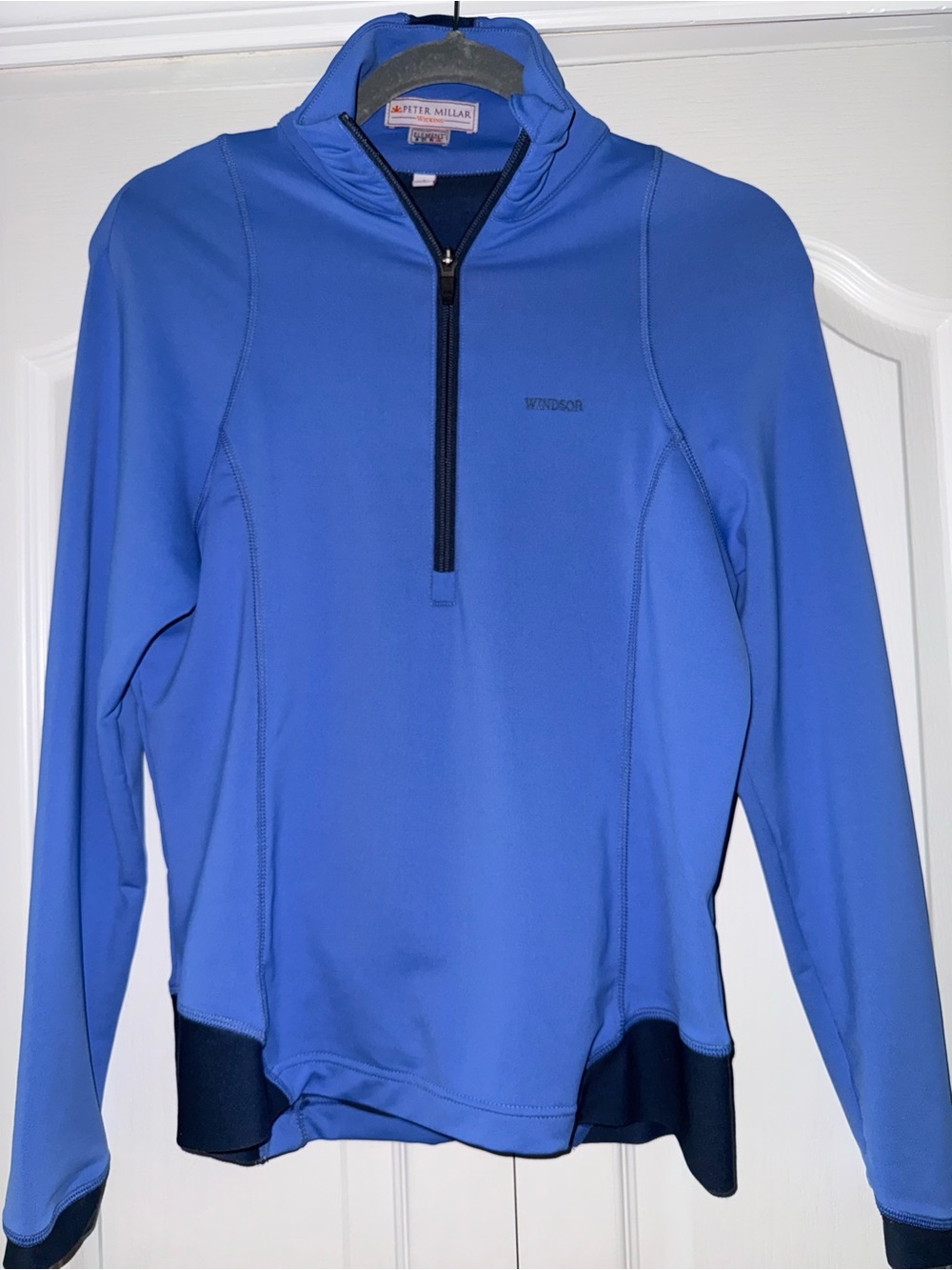 Peter Millar Windsoft Blue quarter zip golf tee